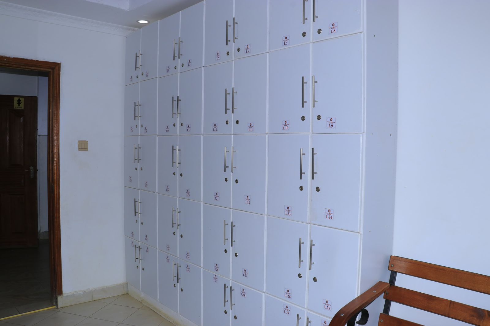 White numbered safety lockers in the swimming pool changing area